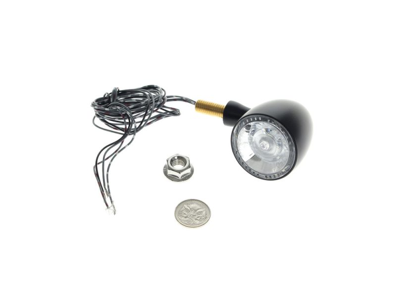 Highly detailed motorcycle LED headlight with wiring harness for custom bikes.