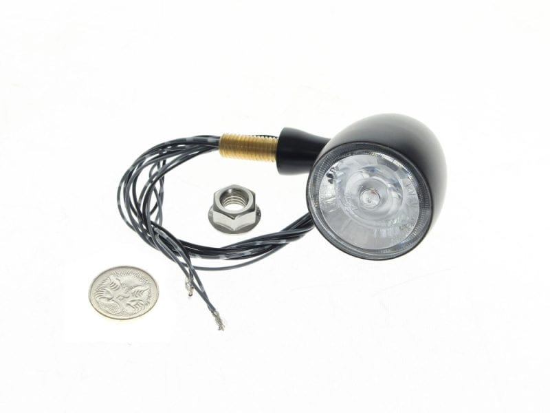High-performance motorcycle LED indicator light with wiring for Revelry Motorcycles.