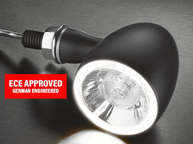 High-quality motorcycle LED headlight with durable black housing.