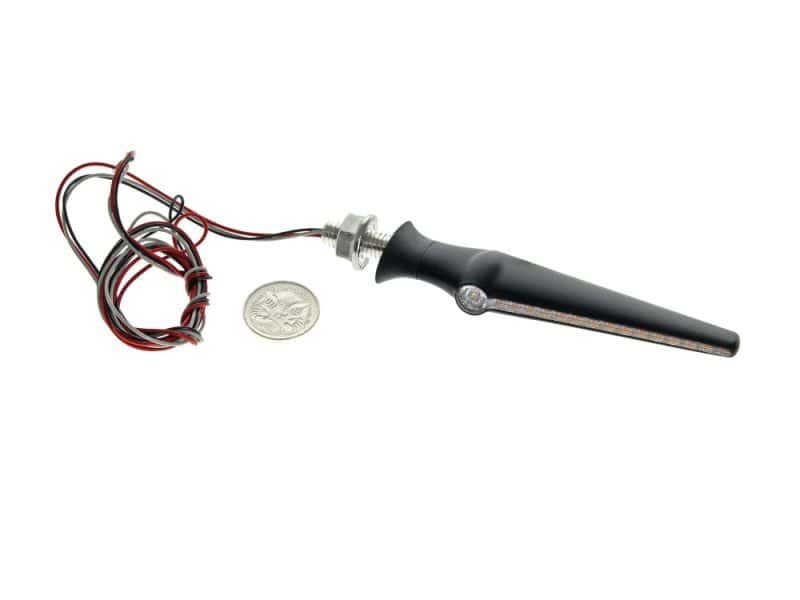LED motorcycle indicator with wiring, sleek black design for Revelry Motorcycles.