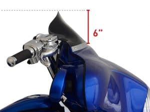 Motorcycle windshield and handlebar close-up at Revelry Motorcycles Melbourne, showcasing custom parts and accessories for bike enthusiasts.