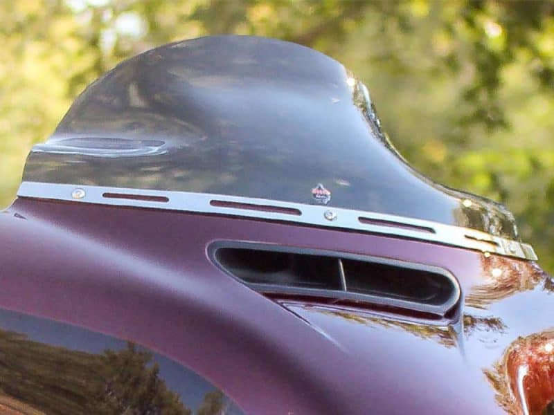 Vintage motorcycle helmet with aerodynamic vents, perfect for motorcycle enthusiasts.