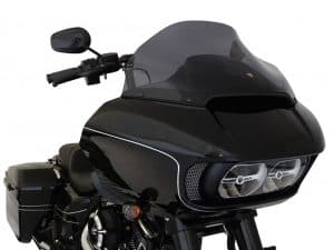 Black touring motorcycle with aerodynamic windshield and sleek design for long-distance rides.