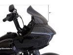 Sleek black motorcycle with a modern touring fairing for comfortable long-distance rides.
