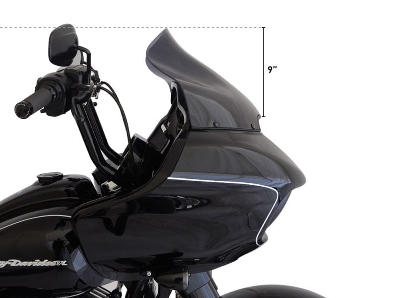 Sleek black motorcycle with a modern touring fairing for comfortable long-distance rides.