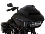 Black motorcycle fairing with sleek design and integrated windscreen.