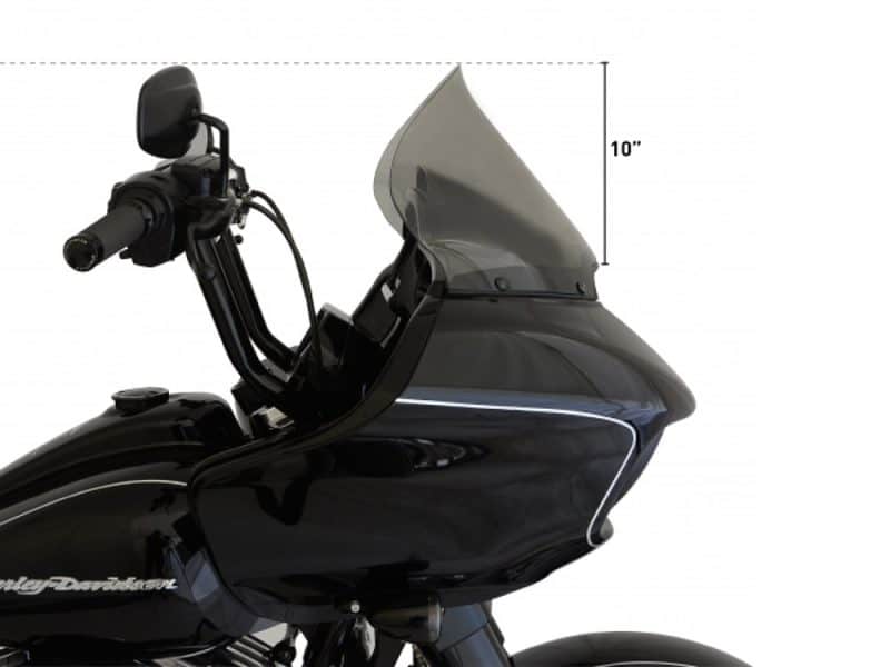 Black motorcycle tourer with a windshield and handlebar accessories.