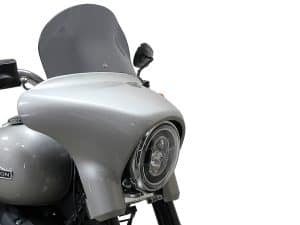 Sleek grey motorcycle fairing for Revelry Motorcycles with aerodynamic design and advanced lighting system.
