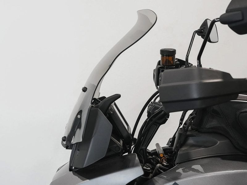 15.5in. Flare Windshield - Tinted. Fits Pan America 2021up. Aviation-style motorcycle windscreen with clip-on attachment for enhanced ride comfort.