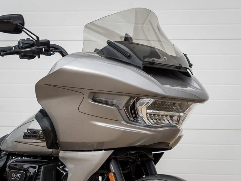 High-end Harley-Davidson motorcycle with touring fairing and advanced windscreen.