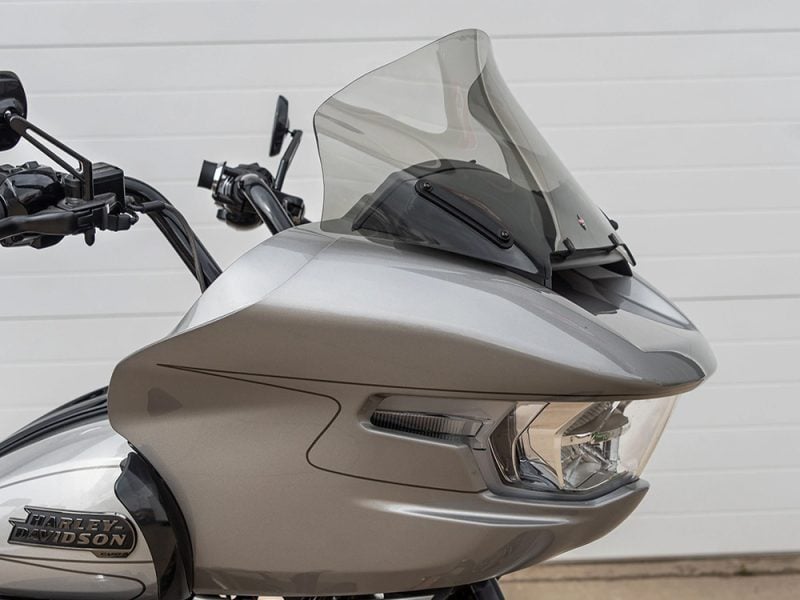 Sleek silver touring motorcycle with advanced windscreen and modern Harley-Davidson design, perfect for long rides.