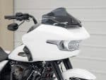 High-quality Harley-Davidson touring motorcycle with sleek white and black design, perfect for long rides.