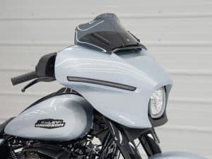 Vintage Harley Davidson motorcycle with custom paint and modern features for motorcycle enthusiasts in Australia.