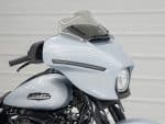 Sleek Harley-Davidson motorcycle with custom fairing and windscreen, perfect for Australian motorcycle enthusiasts.