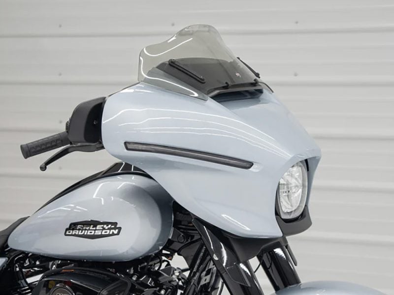 Sleek Harley-Davidson motorcycle with custom fairing and windscreen, perfect for Australian motorcycle enthusiasts.