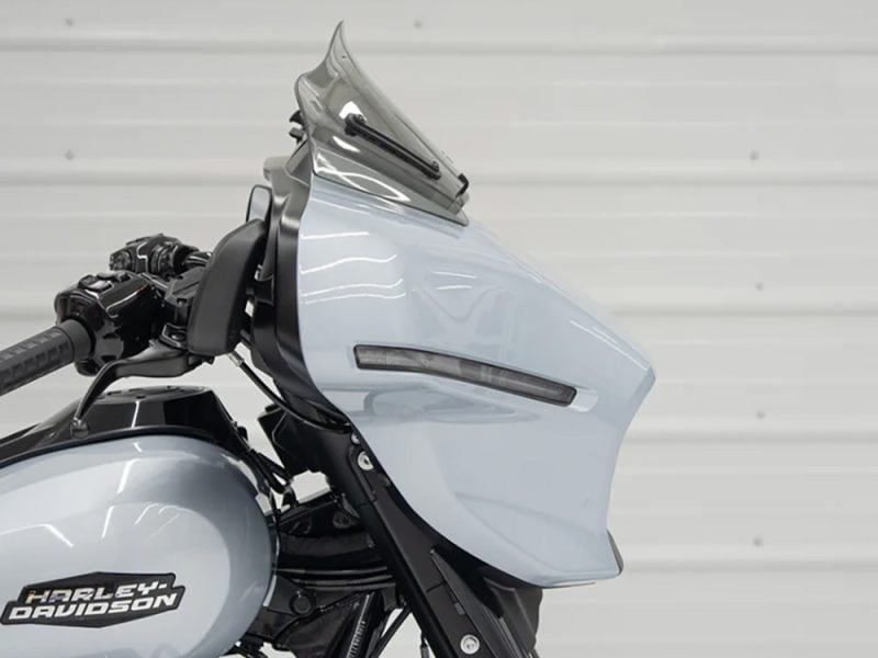 Sleek Harley-Davidson motorcycle with modern touring fairing and advanced features for smooth riding.