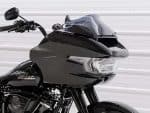 Harley-Davidson motorcycle with sleek black design, aerodynamic fairing, and modern headlights.