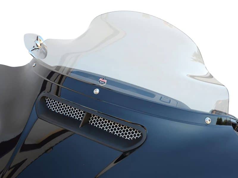 High-performance motorcycle windscreen and part of a sleek black sports bike.
