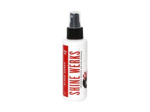 Bright white spray bottle with black spray nozzle for motorcycle maintenance and cleaning.
