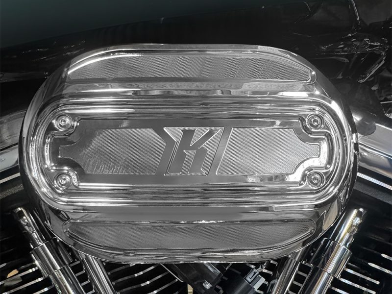 Yamaha V-Star motorcycle engine air cleaner cover with chrome finish and Yamaha logo.