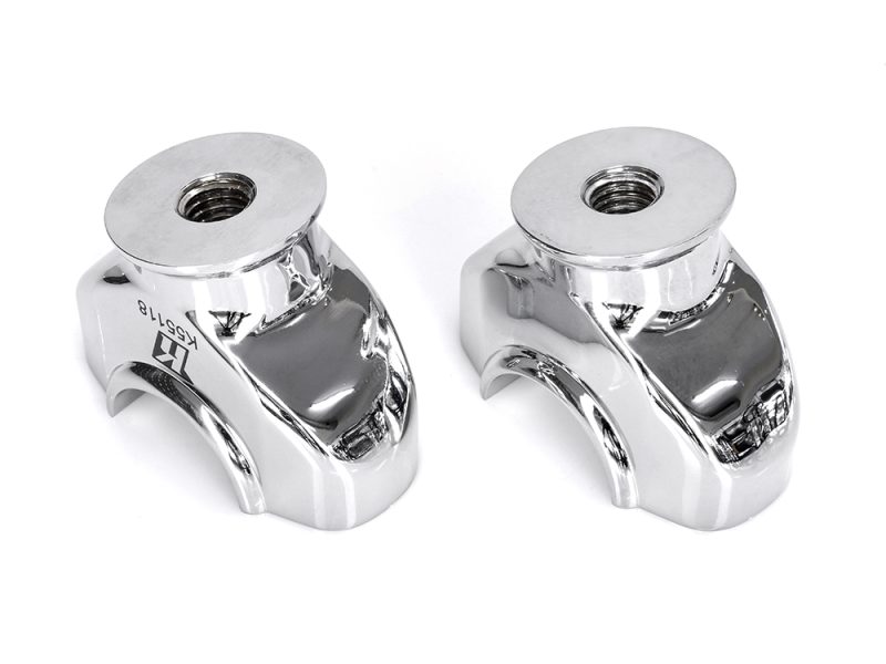 Shiny chrome motorcycle handlebar risers for Revelry Motorcycles Australia.