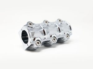 Sleek chrome motorcycle handlebar clamp for Revelry Motorcycles, premium quality accessory.