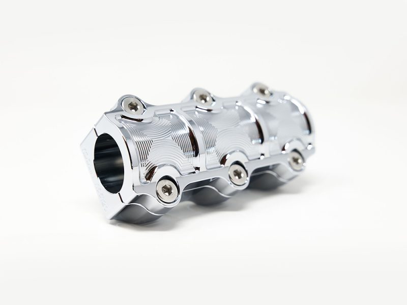 Sleek chrome motorcycle handlebar clamp for Revelry Motorcycles, premium quality accessory.
