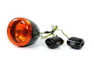 Bright orange motorcycle rear tail light and LED indicators for Revelry Motorcycles.