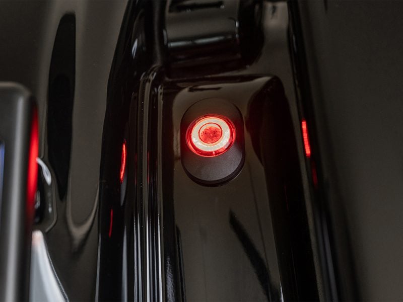 High-performance electric motorcycle rear light with sleek black design for Revelry Motorcycles.
