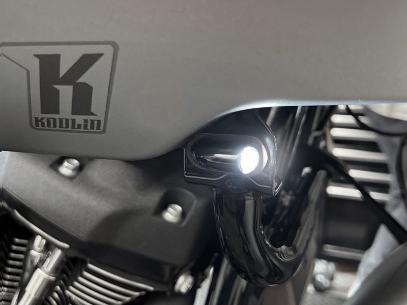 Kodlin motorcycle logo and LED headlight detail on custom motorcycle, Revelry Cycles Australia.