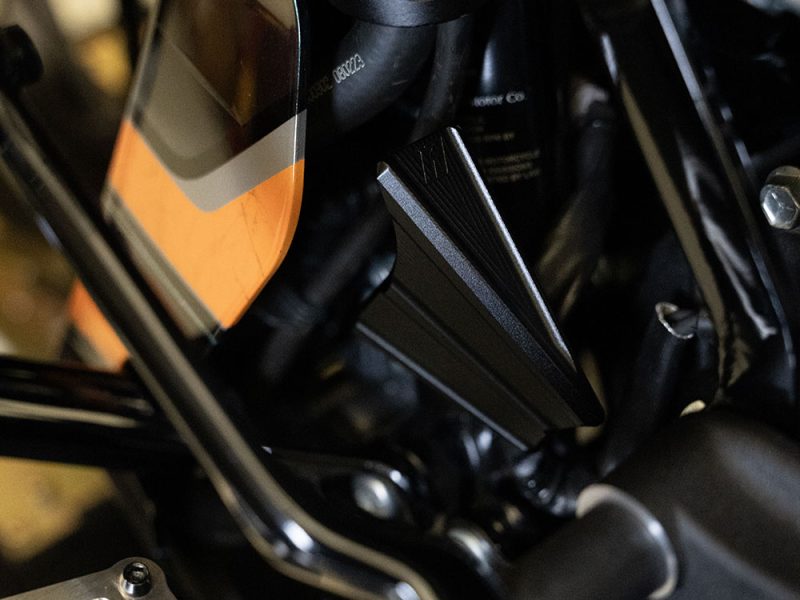 Engine cooling radiator for Revelry Motorcycles, showcasing high-quality motorcycle parts.