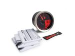 High-performance motorcycle gauge with digital display, manuals, and Kawasaki sticker for Revelry Motorcycles.