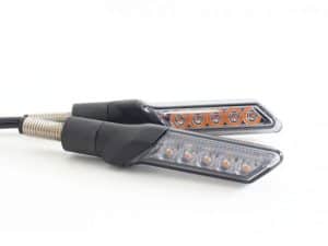 Bright LED motorcycle turn signals with black rubber mounts for Revelry Motorcycles.