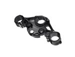 Lightweight black motorcycle triple tree clamp for safety and performance.