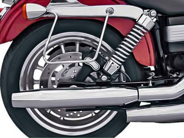 3in. HP-Plus Shorty Tapered Slip-On Mufflers - Chrome. Fits Dyna 1995-2017. Red motorcycle rear wheel with chrome exhaust and suspension, ideal for motorcycle enthusiasts and custom bike riders.