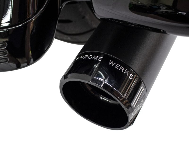 Sleek black motorcycle exhaust pipe with chrome accents, stylish and durable design.