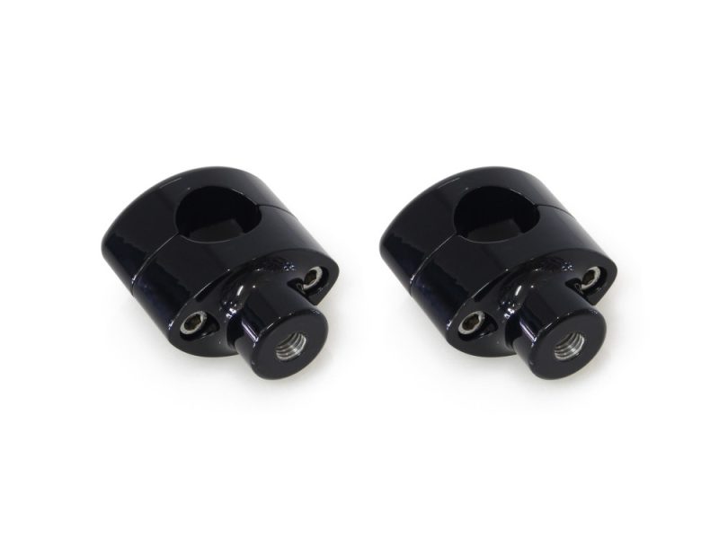 Black motorcycle handlebar risers for Harley Davidson bikes.