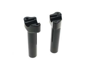Black motorcycle fork inner tubes for bike suspension, high-performance motorcycle parts.