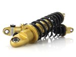 High-performance motorcycle shock absorber with gold finish for Revelry Motorcycles.