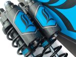 Revelry Motorcycles suspension shocks in black and blue for Australian motorbike enthusiasts.