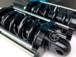 High-performance motorcycle suspension coil shock absorber for enhanced ride comfort and stability.