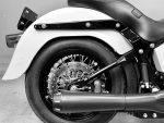 Metzeler motorcycle tyre on a classic black and white rebel motorcycle, showcasing premium motorcycle tyre and custom bike components.