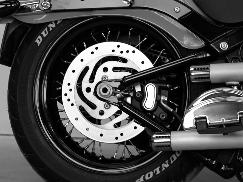 High-performance motorcycle wheel and disc brake system, perfect for Revelry Motorcycles enthusiasts.