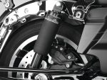 High-performance Harley-Davidson motorcycle front suspension with Legend shock absorber for superior ride quality.