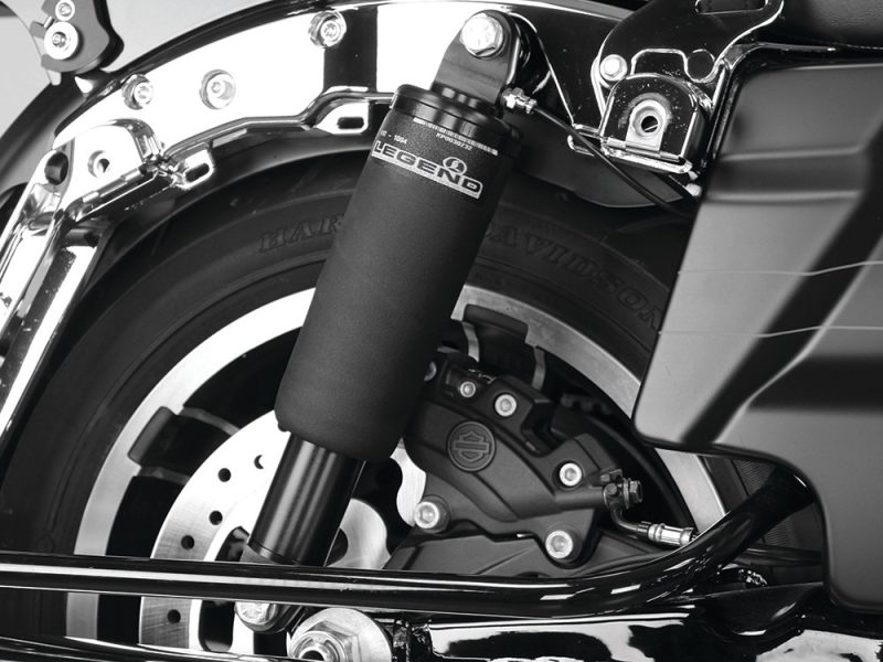 High-performance Harley-Davidson motorcycle front suspension with Legend shock absorber for superior ride quality.