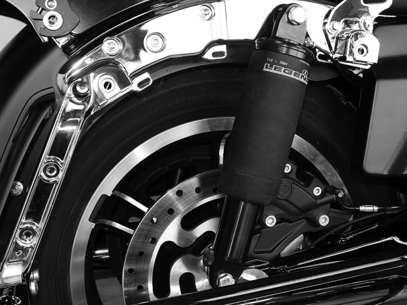 High-performance motorcycle front wheel with advanced suspension and braking system for Revelry Motorcycles in Australia.
