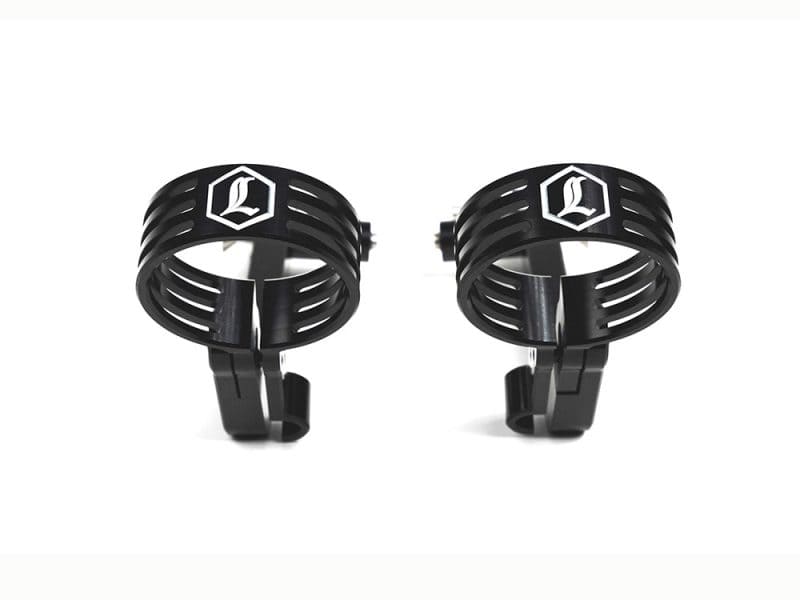 Black motorcycle handlebar risers with Revelry logo for custom bike upgrades.