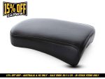 Black motorcycle seat pad for Harley Davidson or custom bikes, premium leather, comfortable riding accessory.