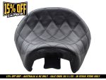 Black quilted motorbike seat with chrome detailing for Revelry Motorcycles.