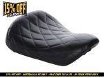 Black quilted motorcycle seat from Revelry Motorcycles, stylish and comfortable for bike enthusiasts.